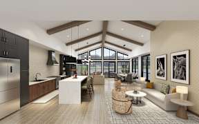 A modern kitchen with a large island and a dining area with a view.